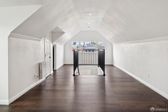 63-65 Jersey St, San Francisco, CA 94114 - additional living space featuring wood finished floors, radiator, and vaulted ceiling