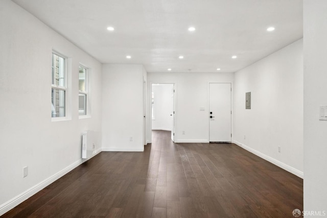 63-65 Jersey St, San Francisco, CA 94114 - empty room featuring radiator heating unit, recessed lighting, and dark wood finished floors