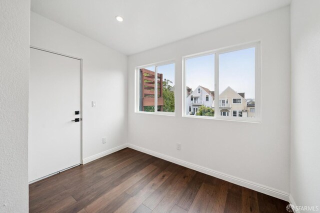 63-65 Jersey St, San Francisco, CA 94114 - empty room featuring dark wood-style flooring and recessed lighting