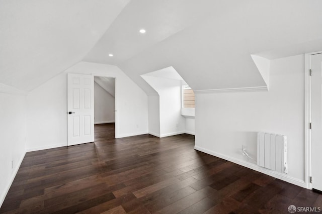 63-65 Jersey St, San Francisco, CA 94114 - bonus room with radiator heating unit, vaulted ceiling, wood finished floors, and recessed lighting