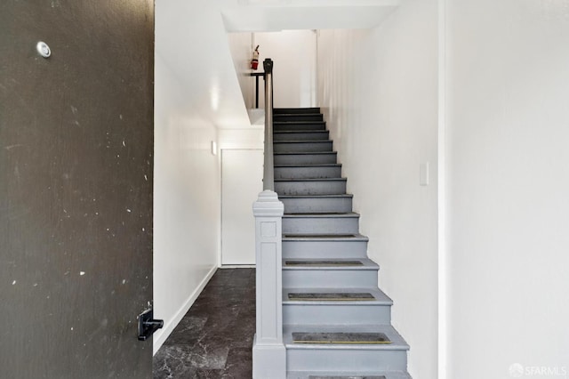 63-65 Jersey St, San Francisco, CA 94114 - stairway featuring baseboards and marble finish flooring
