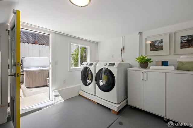 3790 Cesar Chavez St, San Francisco, CA 94110 - laundry room with washer and clothes dryer and cabinet space