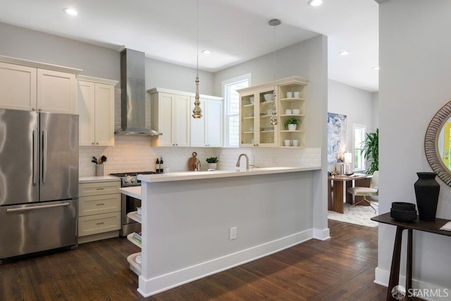 3790 Cesar Chavez St, San Francisco, CA 94110 - kitchen with appliances with stainless steel finishes, wall chimney exhaust hood, open shelves, light countertops, and recessed lighting