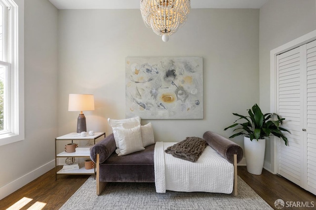 3790 Cesar Chavez St, San Francisco, CA 94110 - living area with wood finished floors, a chandelier, and baseboards