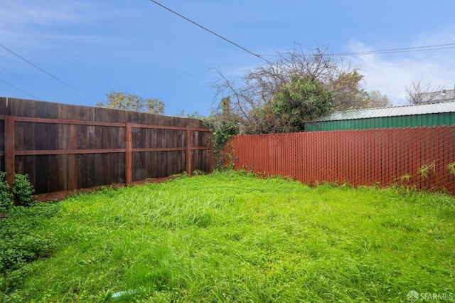 view of yard with fence