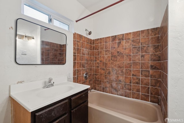 bathroom with bathtub / shower combination and vanity