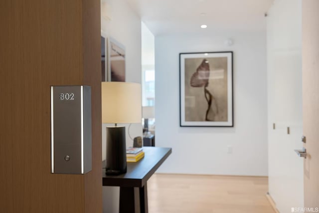 hallway with light wood-type flooring