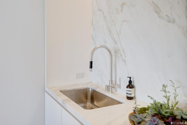 room details with sink and white cabinets