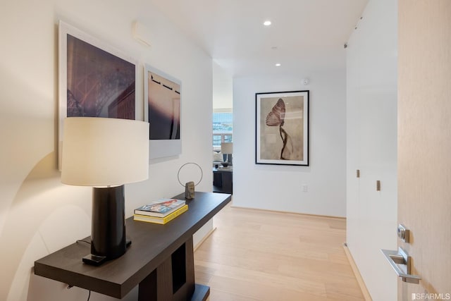 corridor featuring light hardwood / wood-style flooring