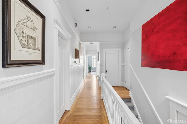 corridor featuring light hardwood / wood-style floors