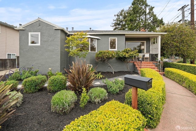 view of front of home with stucco siding