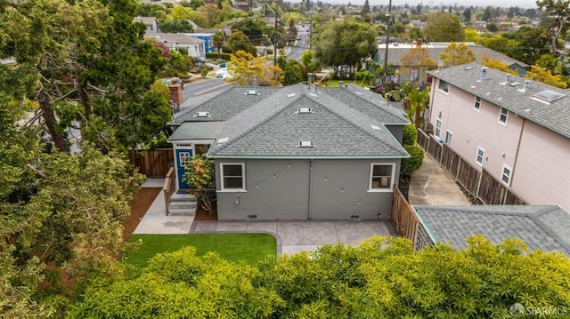 birds eye view of property with a residential view
