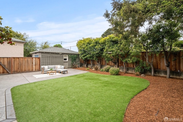 view of yard with a patio, an outdoor living space, and a fenced backyard