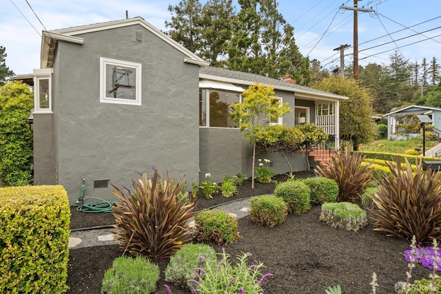 view of home's exterior featuring stucco siding