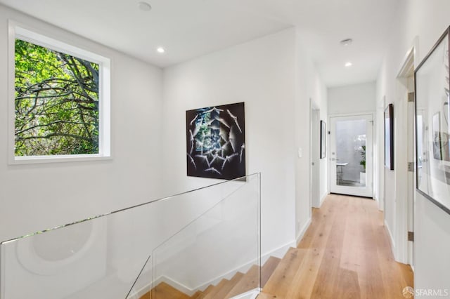 hallway with light wood-type flooring