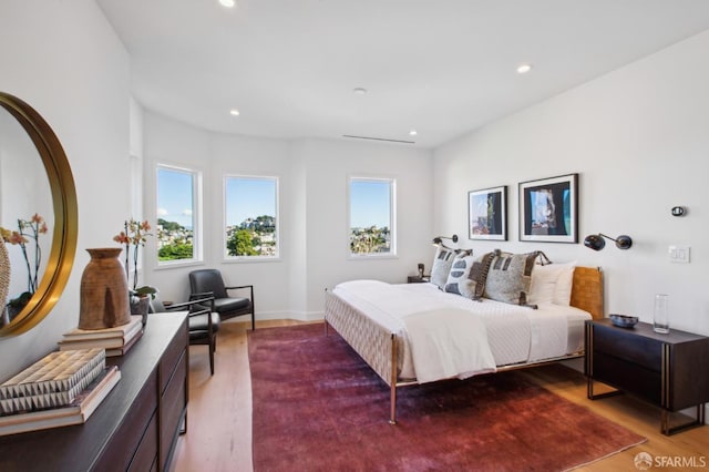 bedroom featuring wood-type flooring