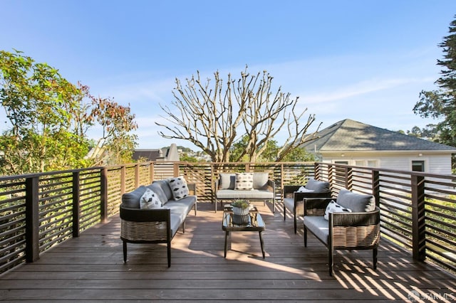 wooden deck with outdoor lounge area