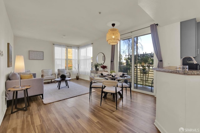 dining room featuring light wood-style flooring