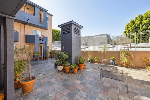 view of patio / terrace with fence