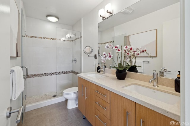 75 Moss St Unit 14, San Francisco, CA 94103 - bathroom featuring double vanity, toilet, and a shower stall