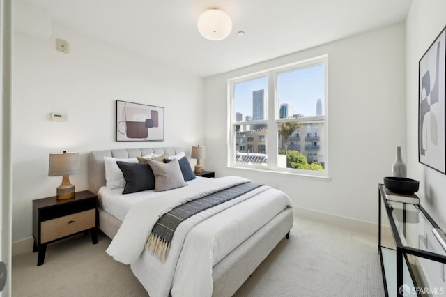 75 Moss St Unit 14, San Francisco, CA 94103 - carpeted bedroom featuring baseboards and a city view