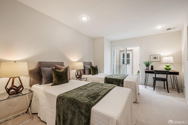 bedroom with recessed lighting, visible vents, and light colored carpet