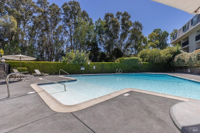 community pool featuring a patio