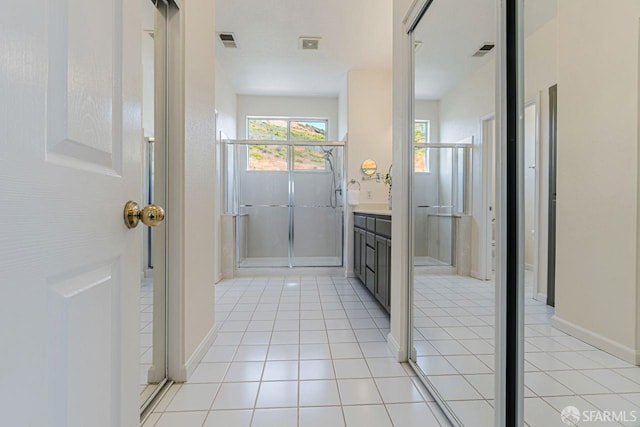 32 Highcrest Ln, South San Francisco, CA 94080 - full bath featuring tile patterned floors, a stall shower, vanity, and baseboards