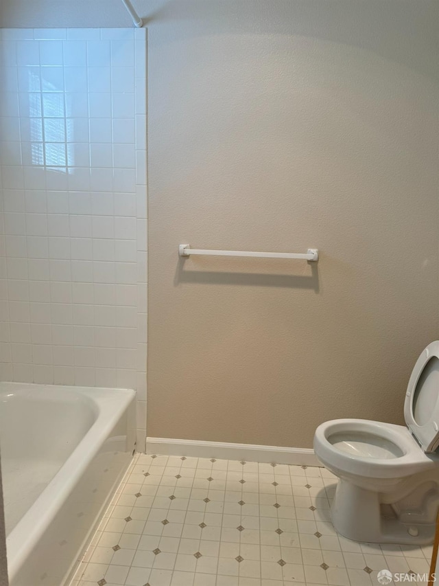 bathroom featuring toilet