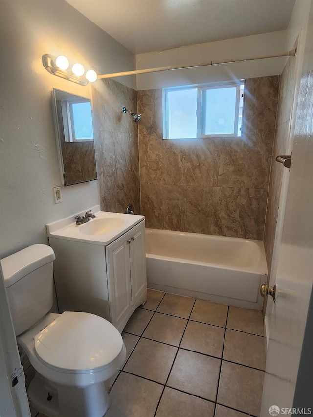 full bathroom featuring vanity, toilet, tile patterned floors, and tiled shower / bath