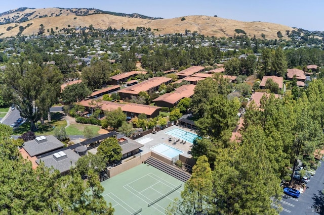 drone / aerial view featuring a mountain view