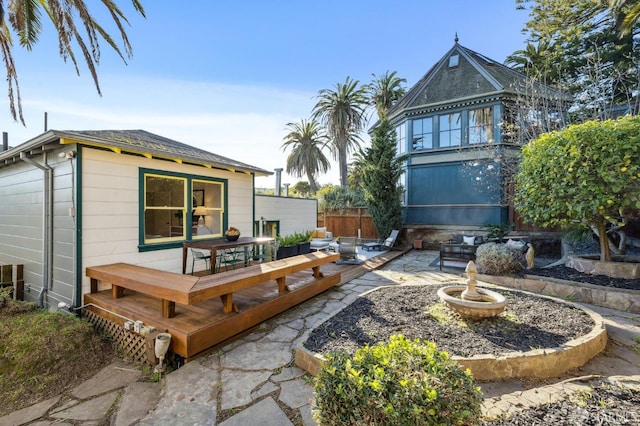 rear view of house with a patio