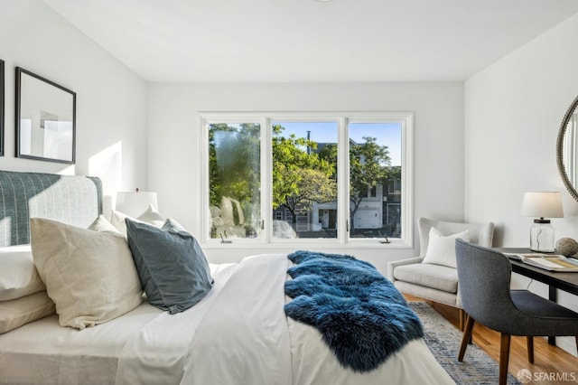 bedroom featuring hardwood / wood-style flooring