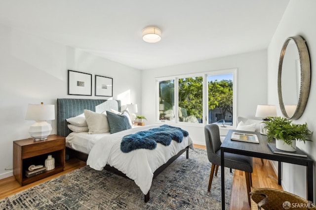 bedroom featuring hardwood / wood-style floors