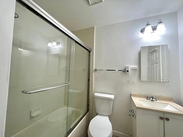 80 Portola Way Unit 105, Tracy, CA 95376 - bathroom featuring vanity, toilet, shower / bath combination with glass door, and a textured wall