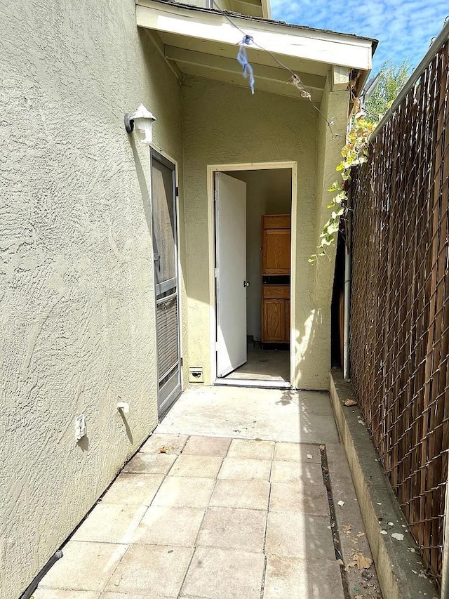 80 Portola Way Unit 105, Tracy, CA 95376 - doorway to property featuring stucco siding