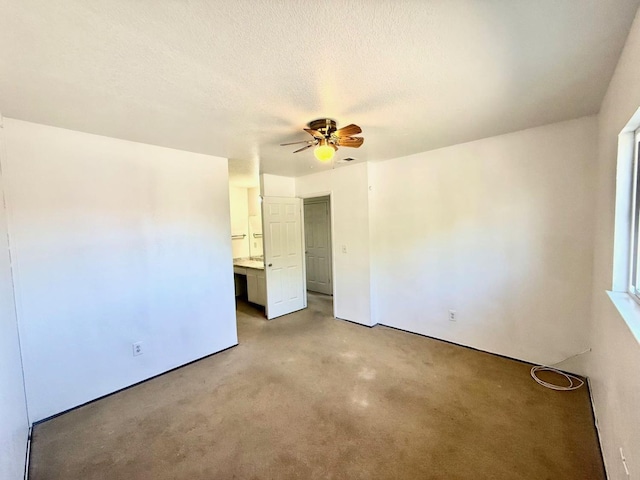 80 Portola Way Unit 105, Tracy, CA 95376 - spare room with ceiling fan, light carpet, and a textured ceiling