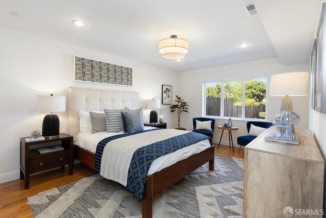 1751 25th Ave, San Francisco, CA 94122 - bedroom with wood finished floors and recessed lighting
