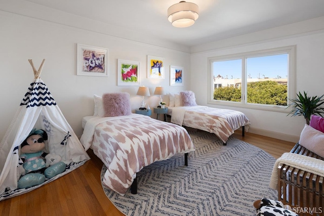 1751 25th Ave, San Francisco, CA 94122 - bedroom with wood finished floors and baseboards