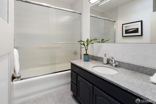 1751 25th Ave, San Francisco, CA 94122 - bathroom featuring vanity and bath / shower combo with glass door