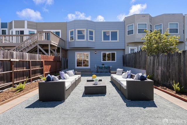 1751 25th Ave, San Francisco, CA 94122 - rear view of property with an outdoor living space, a fenced backyard, and a patio