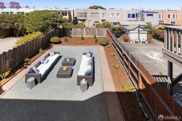 1751 25th Ave, San Francisco, CA 94122 - fenced backyard featuring an outdoor hangout area, a residential view, and a patio area