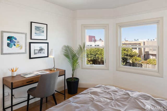 1751 25th Ave, San Francisco, CA 94122 - bedroom featuring wood finished floors and an office area