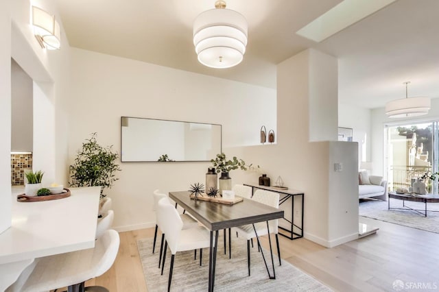 dining room featuring light wood-type flooring