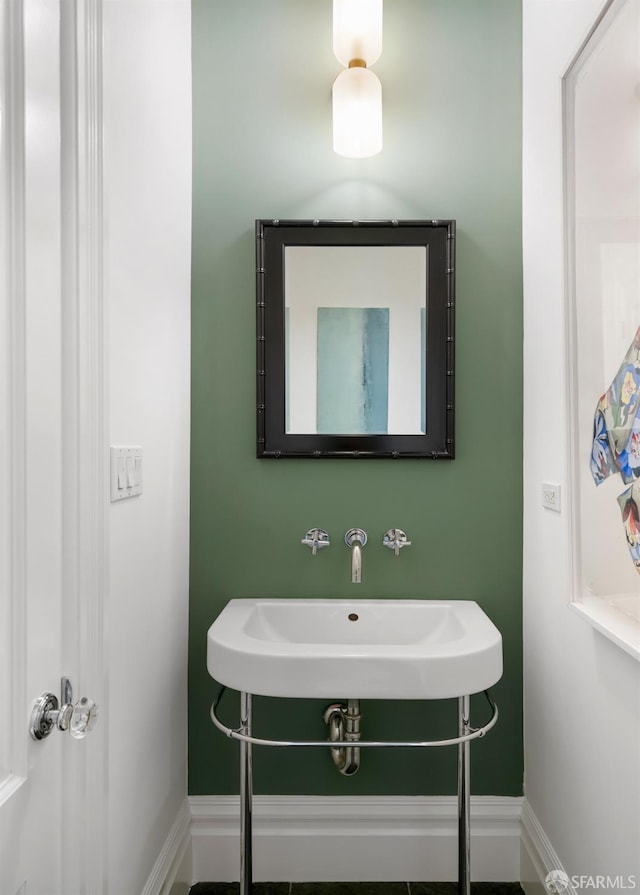 49 Hill St, San Francisco, CA 94110 - bathroom with a sink and baseboards