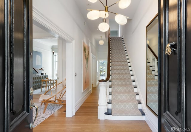49 Hill St, San Francisco, CA 94110 - foyer featuring light wood-style flooring and stairs