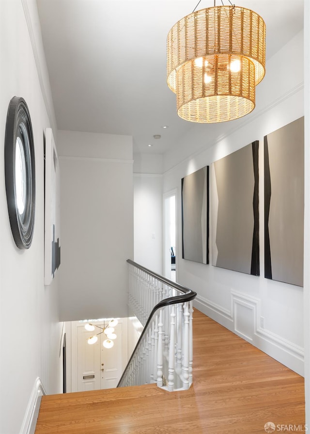 49 Hill St, San Francisco, CA 94110 - hallway featuring a chandelier, an upstairs landing, wood finished floors, and recessed lighting