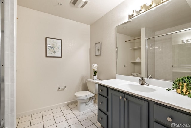 bathroom featuring vanity, tile patterned flooring, toilet, and a shower with shower door