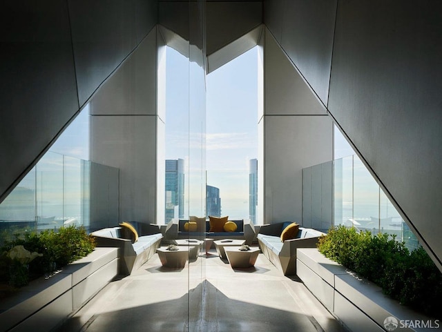 view of patio featuring an outdoor living space with a fire pit