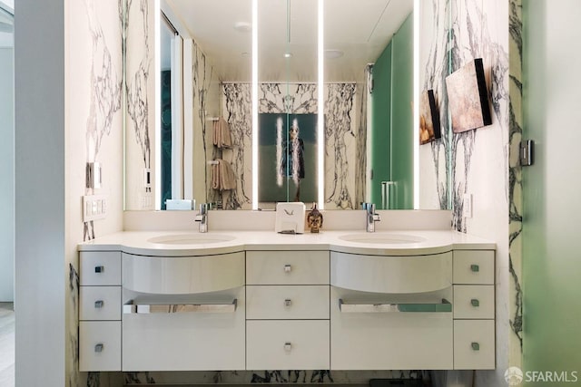 bathroom featuring vanity and curtained shower